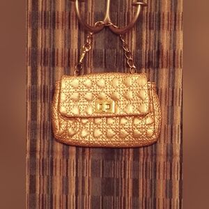 Macy's Tiny Gold clutch/purse/wristlet with gold link claw clasp handle